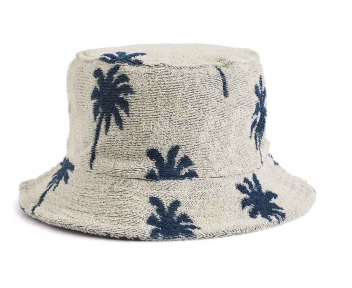 Molo Siks Palm Hat featuring a wide brim and tropical palm print, perfect for sun protection and stylish outdoor wear.