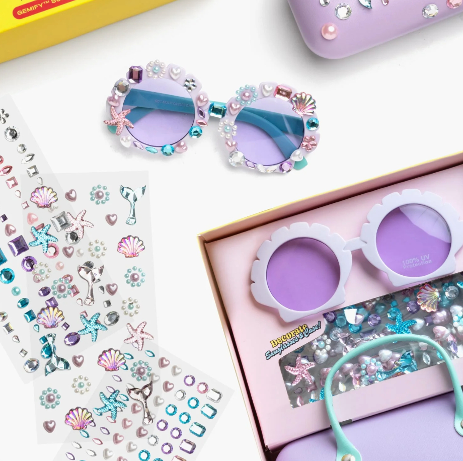 Super Smalls Mermaid Splash & Sparkle Gemify® sunglasses with colorful frames and matching case, designed for kids' fun and style.