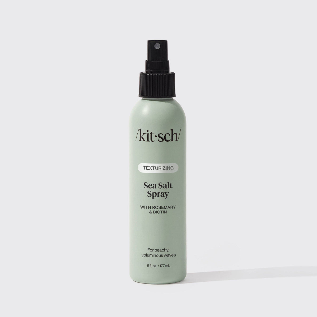 KITSCH texturizing sea salt spray bottle with spray nozzle, designed for beach waves and textured hair styling.