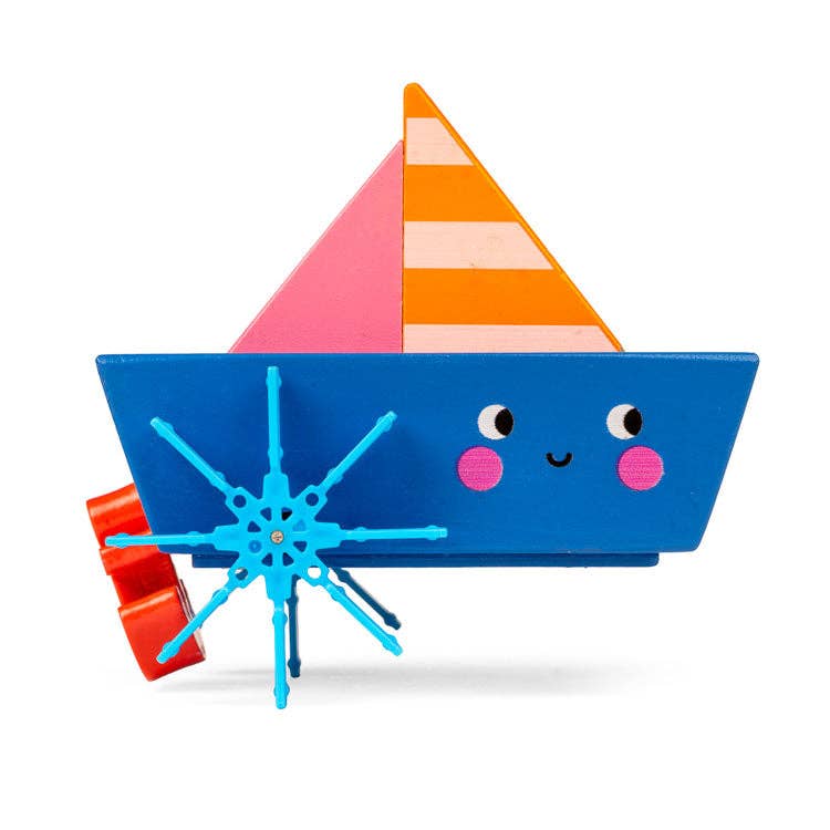Wind-up boat toy by Kikkerland Design Inc with a colorful design, ready to float on water or be wound up for fun.