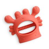Itzy Ritzy Crab Bitzy Grip™ baby teether with soft silicone and textured surface for soothing gums, shaped like a cute crab.