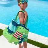 Stephen Joseph Gifts turtle beach tote bag with colorful turtle design, perfect for carrying essentials to the beach.