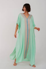 Checkered aqua sequin thobe by pītusa, featuring a stylish long Islamic dress with a shimmering checkered pattern.