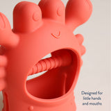 Itzy Ritzy Crab Bitzy Grip™ baby teething toy with soft silicone material and colorful crab design for soothing teething relief.