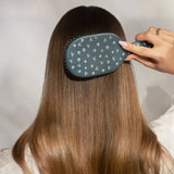 KITSCH Smooth & Polish Brush with coastal blue print, showing a close-up of the brush's handle and bristles.