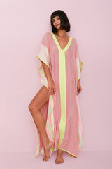 Petite contrast striped thobe in multicolor with bold pattern, made by pītusa, displayed on a hanger.
