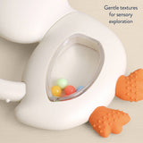Itzy Ritzy Bitzy Shake silicone teether with cherry design and attached rattle for babies.