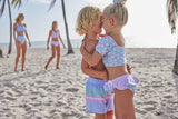 Blueberry Bay Haven Oasis two-piece swimsuit featuring a vibrant patterned top and matching bottom on a model.