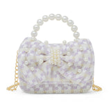 Pink girls' tweed jumbo pearl bow handbag with a cute hand strap, featuring decorative pearls and a stylish design.