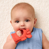 Itzy Ritzy Crab Bitzy Grip™ baby teether with soft silicone and textured surface for soothing gums, shaped like a cute crab.