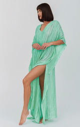 Metallic weave thobe in seafoam color by pītusa, featuring a traditional long robe design with intricate metallic accents.