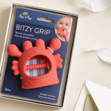 Itzy Ritzy Crab Bitzy Grip™ baby teething toy with soft silicone and textured surface for soothing sore gums.