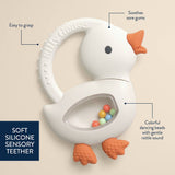 Itzy Ritzy Bitzy Shake silicone teether with cherry design and rattle for babies, soft and colorful for soothing gums.
