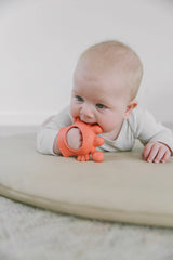 Itzy Ritzy Crab Bitzy Grip™ featuring a cute crab design, soft silicone material, perfect for baby teething and grip comfort.