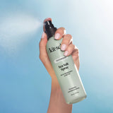 KITSCH texturizing sea salt spray bottle with clear label and silver cap, designed for creating beachy, tousled hair texture.