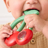 Itzy Ritzy Bitzy Shake silicone teether with cherry design and rattle, ideal for soothing babies during teething.