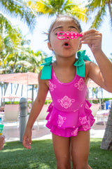 Blueberry Bay Sea Breeze one-piece swimsuit with blue and white tropical print, featuring a scoop neckline and adjustable straps.