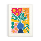 Blooming Wildflowers punch needle kit by Chronicle Books featuring colorful wildflower designs and punch needle embroidery tools.