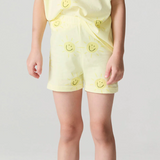 Chaser Happy Happy Shorts in vibrant fabric, featuring a relaxed fit and colorful pattern, perfect for casual summer wear.