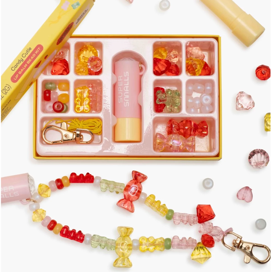 Super Smalls Candy Cutie Lip Balm Bead Kit featuring colorful beads and tools for making personalized lip balms.