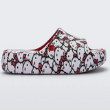 Mini Melissa free platform slide sandals featuring Hello Kitty and friends for kids, with colorful cartoon character designs.