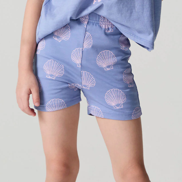 Chaser Seashell Dreams allover shorts with a colorful seashell pattern and relaxed fit, perfect for casual summer wear.