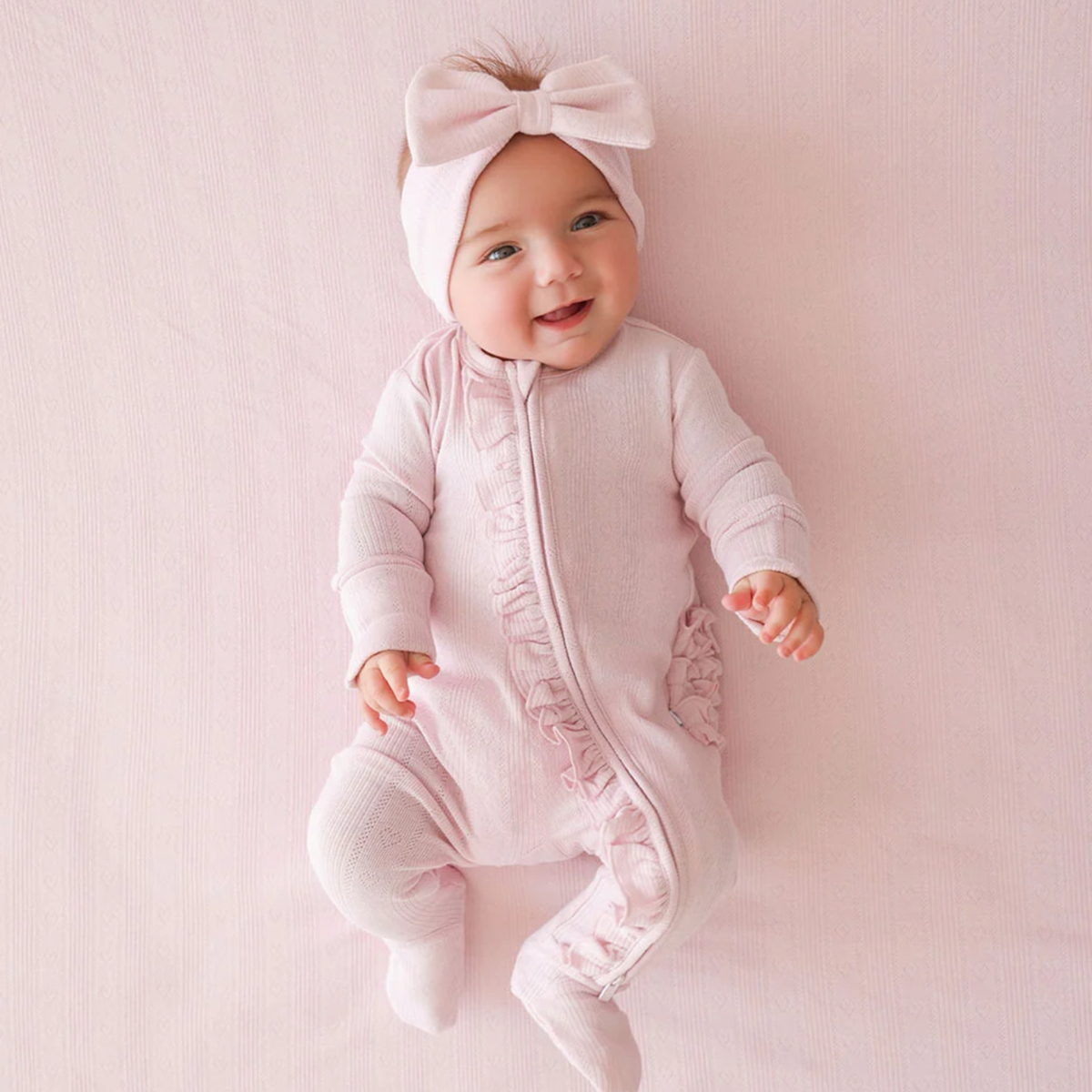 Icing Pink Pointelle Footie Ruffled Zippered One Piece