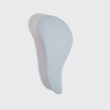 KITSCH detangling brush in haze blue with flexible bristles for gentle hair detangling and smooth styling.