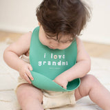 Green Love Grandma Wonder Bib by Bella Tunno, soft and absorbent baby bib with a playful design and adjustable neck strap.
