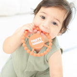 Bella Tunno Party Animal Teether in orange, soft silicone teether with animal design for babies.