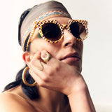 SARDINE Aster Toasted Moxie Round Checkered Sunglasses with black and white checkered pattern and round frames