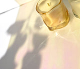 7.2oz Choice Blooms No. 3 Moss and Amber Candle with a glass jar and minimalist design.