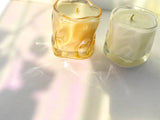 7.2oz Choice Blooms No. 3 Moss + Amber Candle with a glass jar, green moss, and warm amber wax inside.