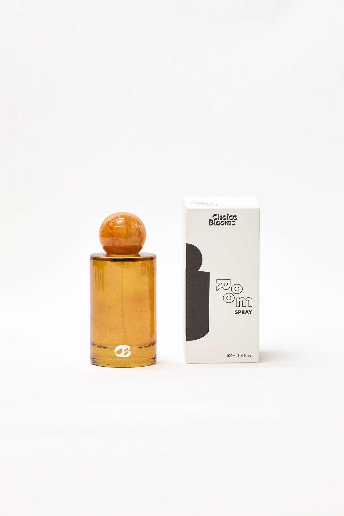 Room linen fragrance spray by Choice Blooms featuring amber and wild flower scents in a sleek spray bottle.