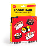 Foodie Baby crinkle fabric stroller book by Chronicle Books featuring colorful food-themed pages for infants.