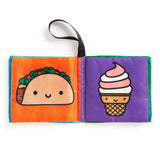 Foodie Baby crinkle fabric stroller book by Chronicle Books with colorful food-themed illustrations and soft textures.