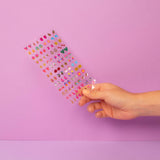Kids sticky earrings featuring colorful unicorn shapes, designed by OMY, perfect for playful and fun ear accessories.