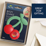Itzy Ritzy Bitzy Shake silicone teether with cherries design and attached rattle for babies to chew and play with.