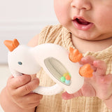 Itzy Ritzy Bitzy Shake silicone teether with cherries design and attached rattle for babies.
