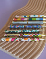 Idlewild Co. Grid Ballpoint Luxe Pen with sleek design and metallic finish, perfect for writing in style.