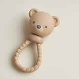 Itzy Ritzy Bear Sweetie Rattle toy for babies, featuring a soft plush bear with a gentle rattle sound for sensory play.