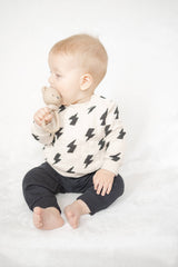 Itzy Ritzy Bear Sweetie Rattle for infants, featuring soft fabric and a friendly bear design, perfect for baby's early sensory play.