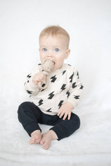 Itzy Ritzy Bear Sweetie Rattle for babies, soft plush toy with a gentle rattle inside, designed for soothing newborns.