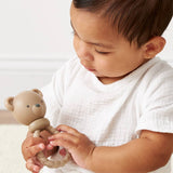 Itzy Ritzy Bear Sweetie Rattle for babies, soft plush toy with a gentle rattle inside, perfect for sensory play and comfort.