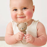 Itzy Ritzy Bear Sweetie Rattle for babies, soft plush toy with a gentle rattle inside, designed for infant sensory play.