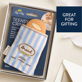 Itzy Ritzy Baguette Teensy Crinkle™ baby bag with crinkled fabric and compact design, shown in a neutral color.