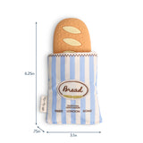 Itzy Ritzy Baguette Teensy Crinkle bag with crinkled fabric, compact design, and stylish appearance for trendy, functional accessories.