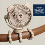 Itzy Ritzy Itzy Breeze 3-Speed Stroller Fan mounted on a stroller, showing adjustable fan blades and sleek design for cooling on the go.