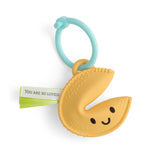 Itzy Ritzy Itzy Treat™ Fortune Cookie Teether with soft silicone material and colorful design for soothing baby gums.