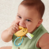 Itzy Ritzy Itzy Treat Fortune Cookie Teether with soft silicone and colorful design for babies' teething needs.